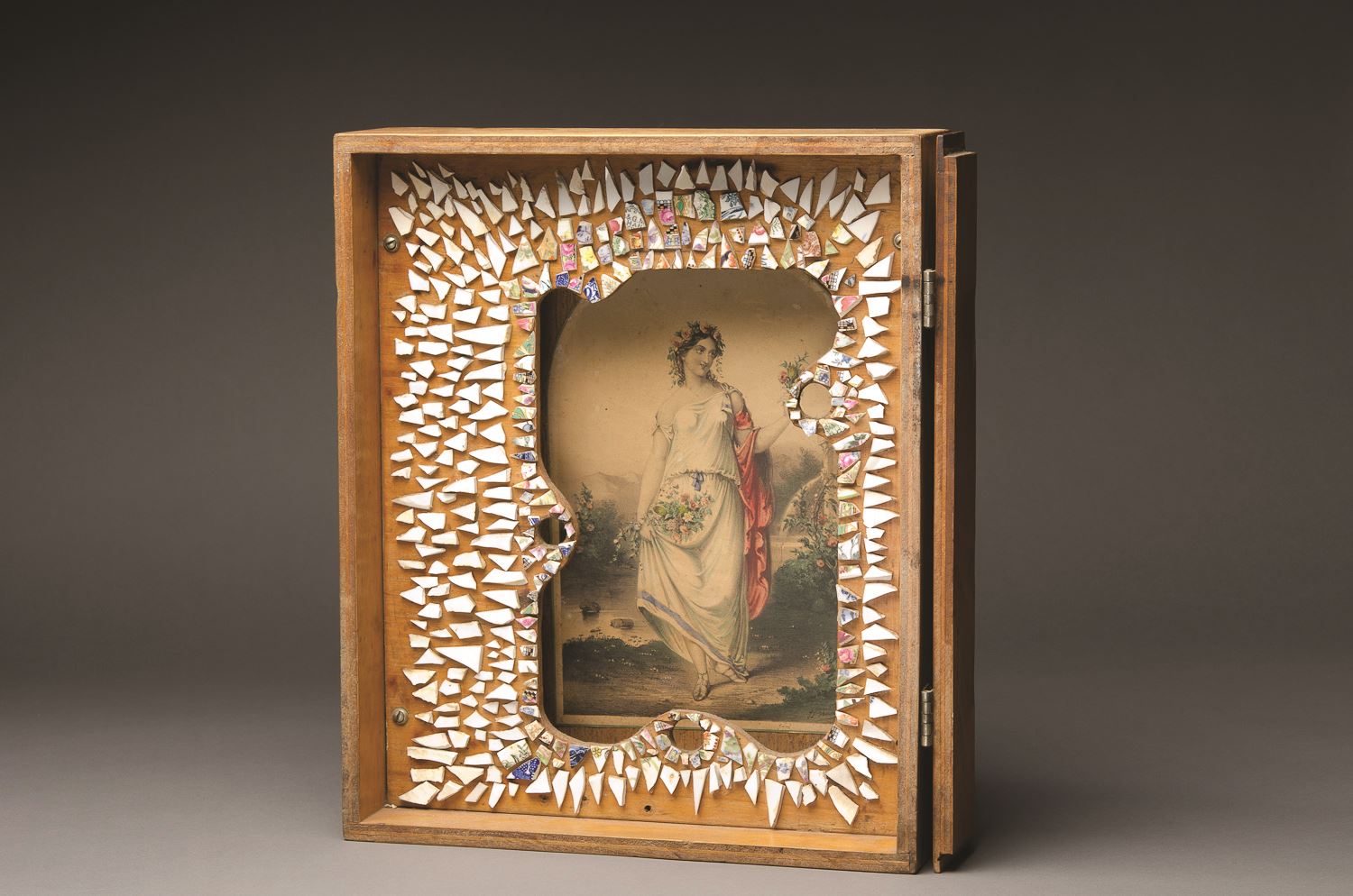 Rosalie Gascoigne Flora Galop 1976 found wooden cabinet, wood frame, shards of china and hand coloured engraving, glue and screws Purchased by Newcastle Art Gallery Foundation 2013 Newcastle Art Gallery collection