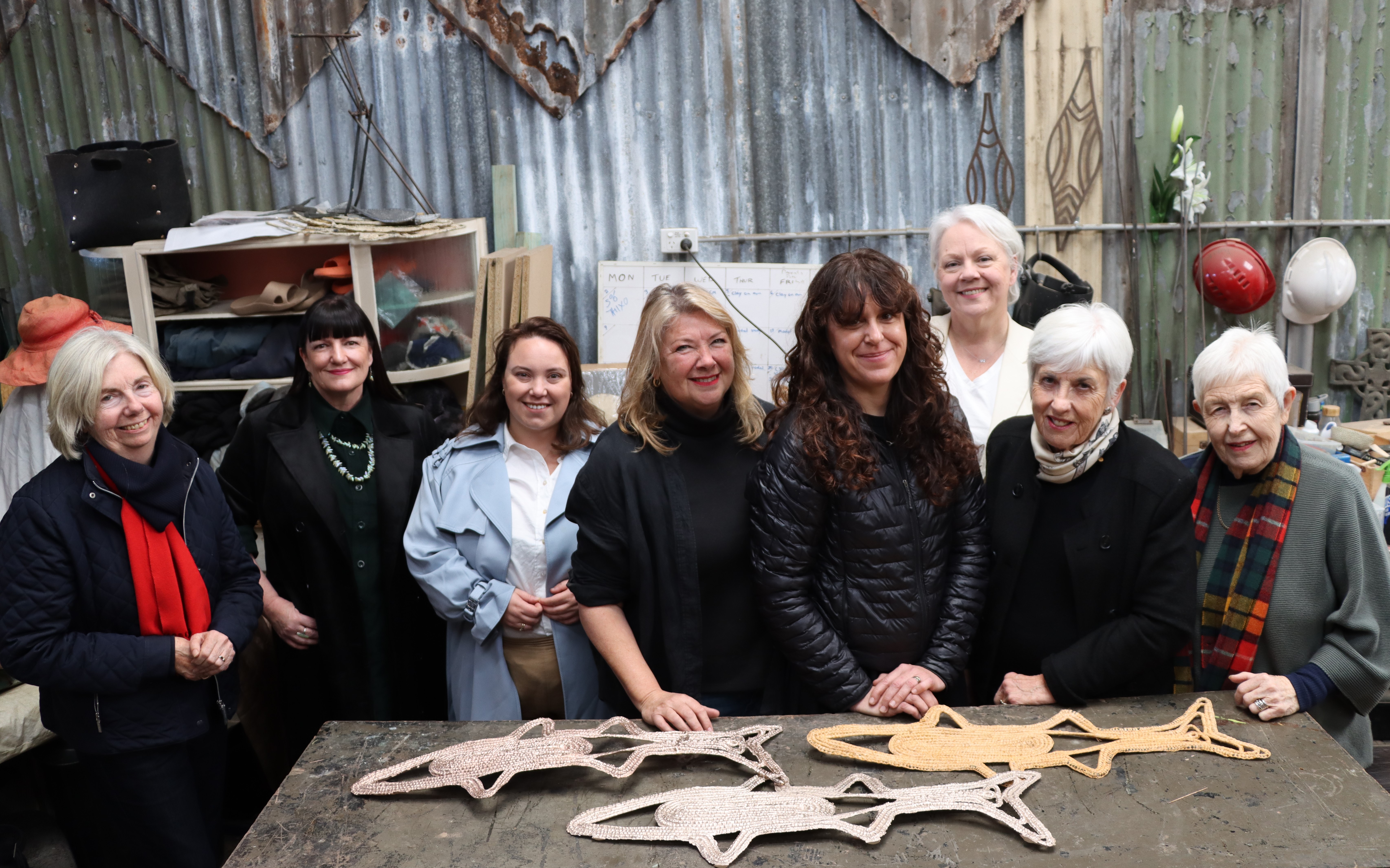 Councillor Margaret Wood, Art Gallery Director Lauretta Morton OAM, Councillor Deahnna Richardson, artist Julie Squires, artist Shellie Smith, Councillor Carol Duncan, and Newcastle Art Gallery Society President, Prue Viggers OAM and Vice Chair Gael Davies OAM with part of the commissioned work.